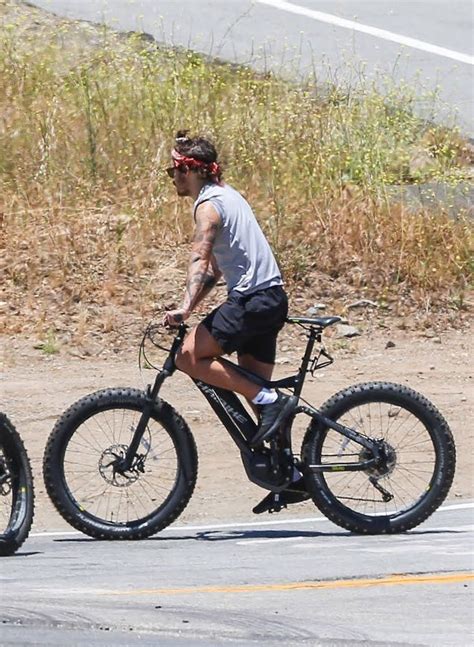 Harry Styles On A Bike